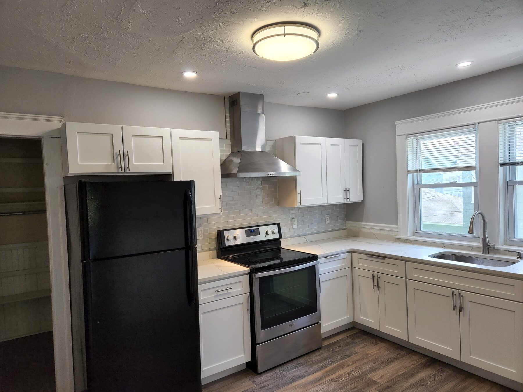 Updated white kitchen at 148 Russell St #2